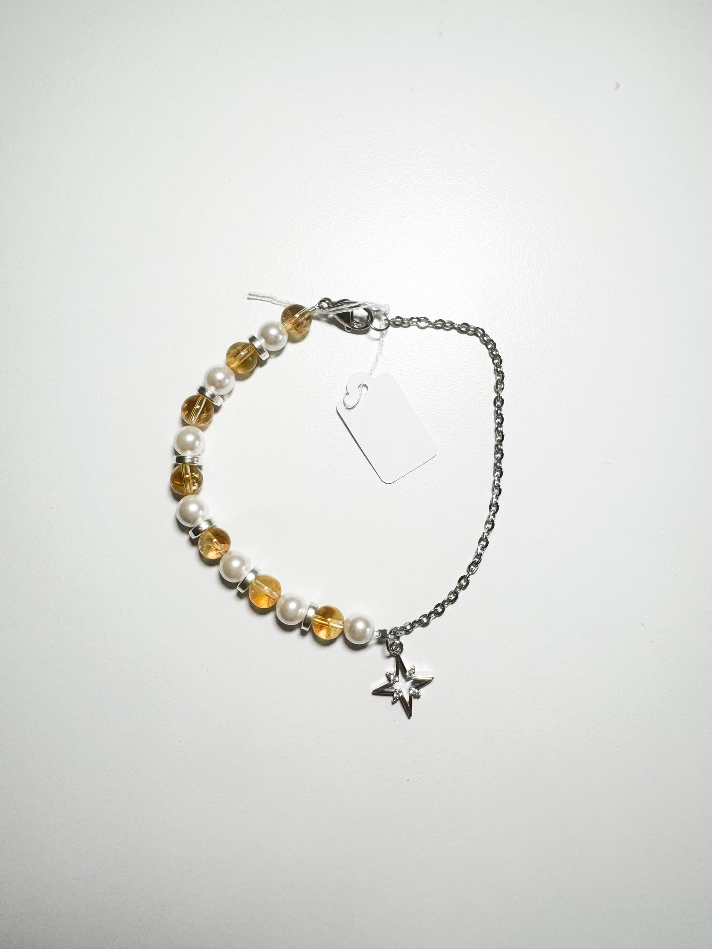 Bracciale ciondolo a stella con pietra citrino e madreperla