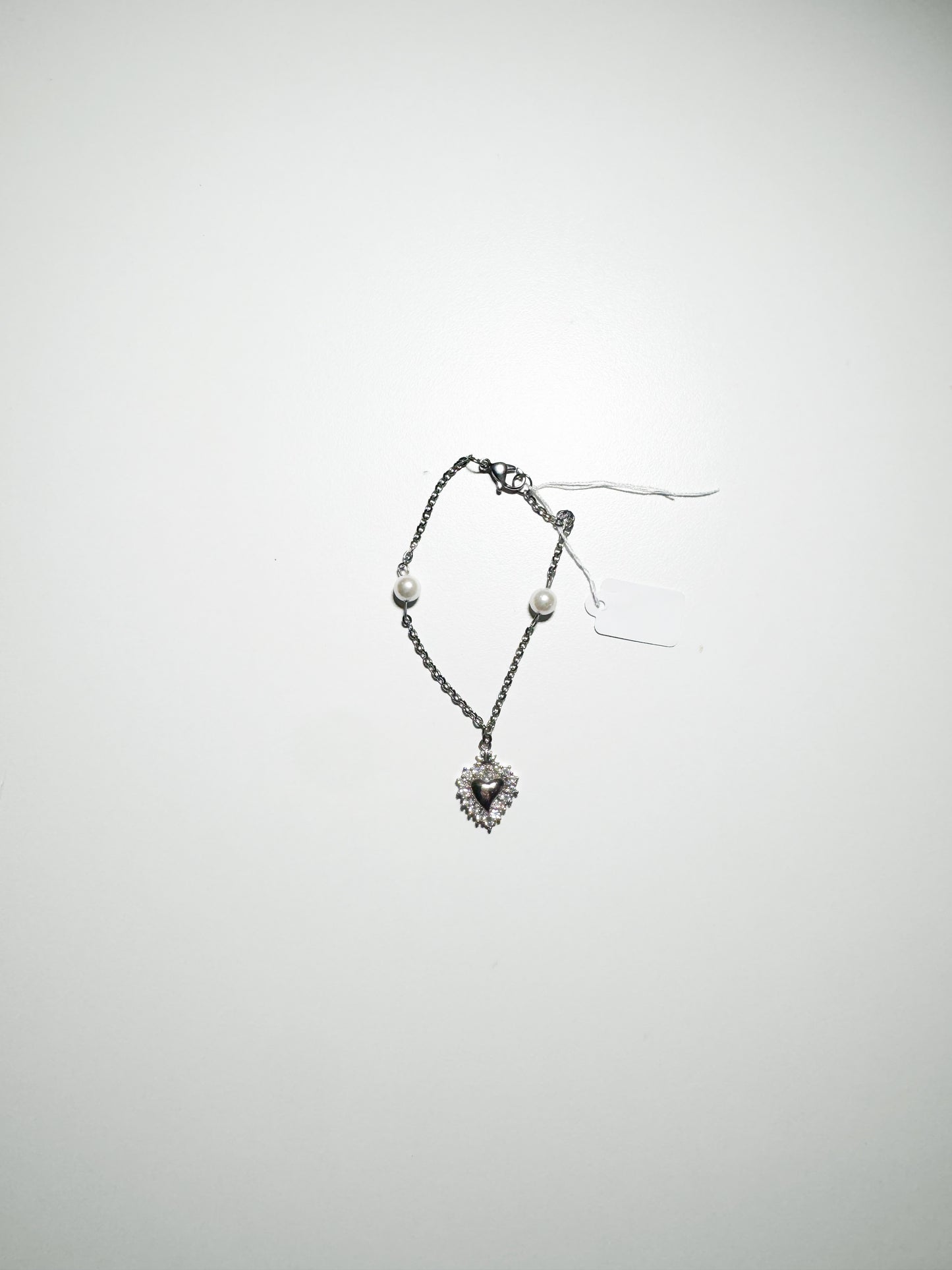 Bracciale cuore sacro e madreperle