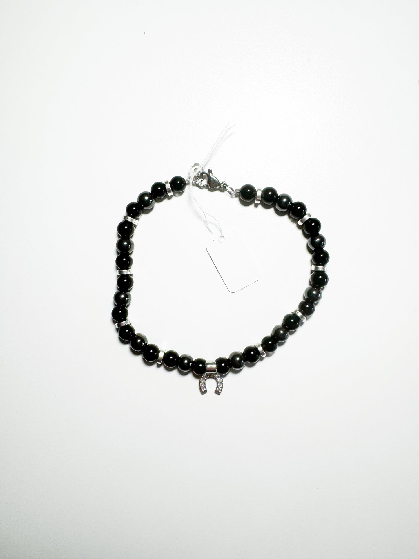 Bracciale con ciondolo ferro di cavallo e calcedonio nero