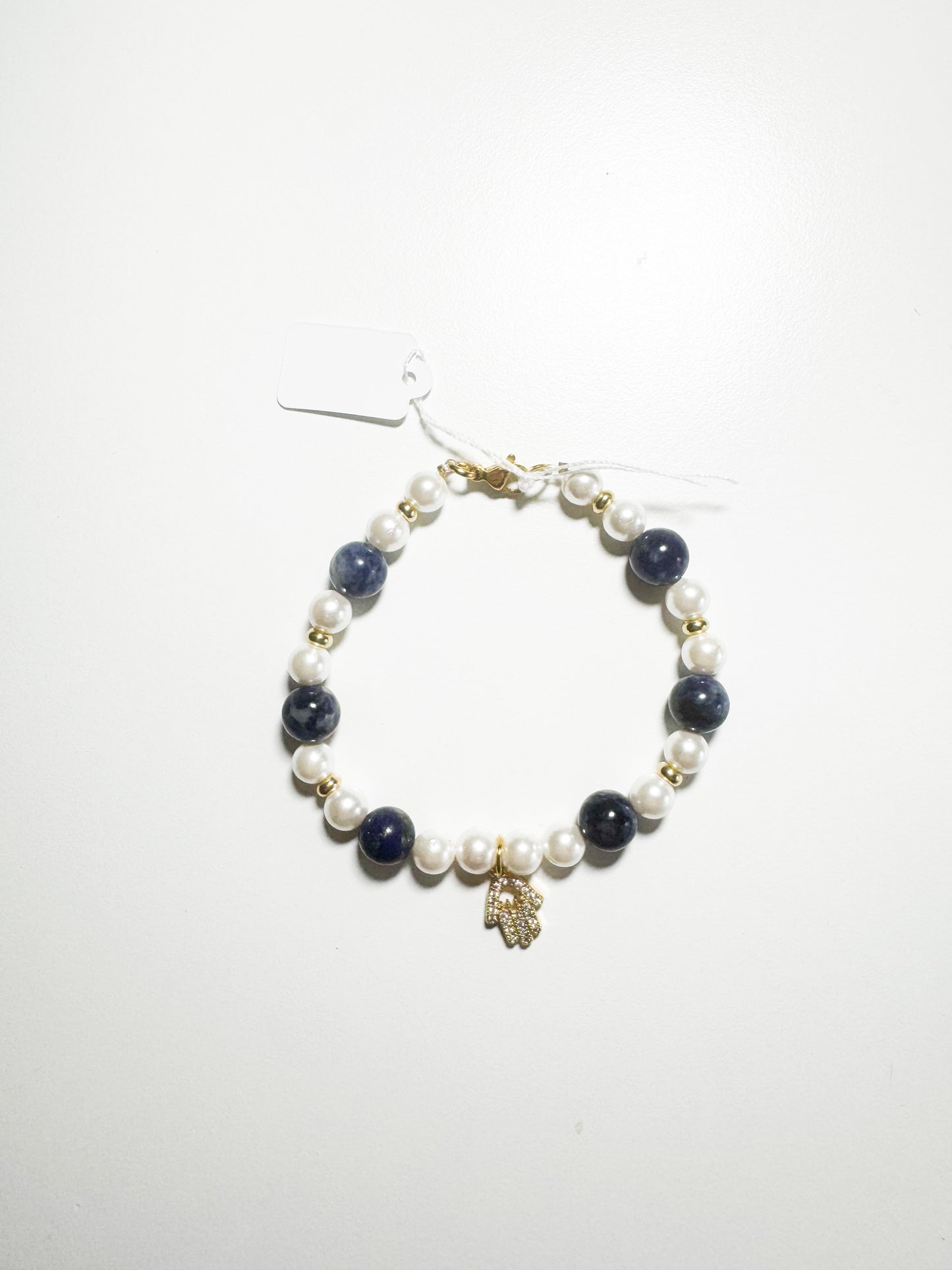 Bracciale ciondolo mano di fatima pietra lapislazzuli e madreperla