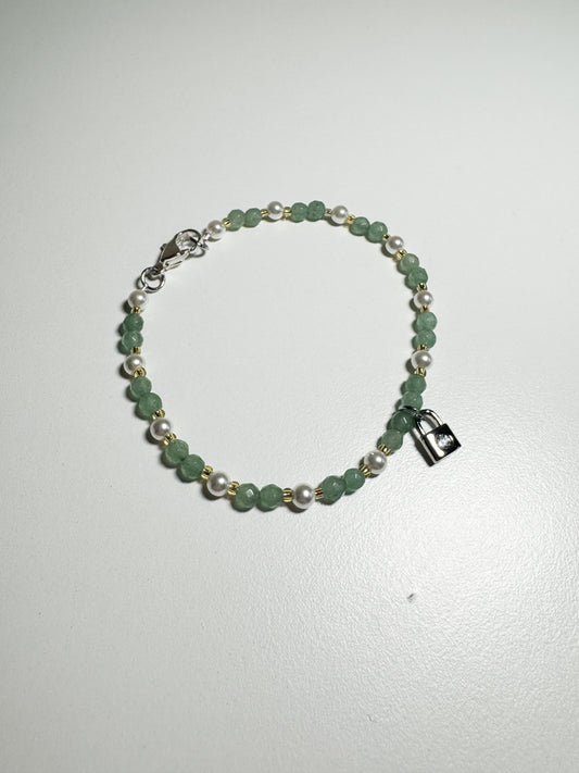 Bracciale con ciondolo a forma di lucchetto